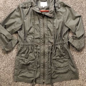 Olive green front zip jacket with cinch waist